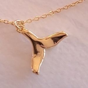 Whales Tail on a golden chain. Nwt